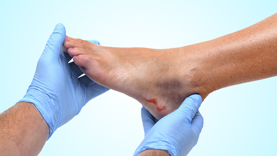 Medical massage at the foot in a physiotherapy center.